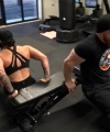 Rhea_Ripley_flexes_on_Sheamus_with_her__Nightmare__Arms_workout_5611.jpg