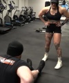 Rhea_Ripley_flexes_on_Sheamus_with_her__Nightmare__Arms_workout_5648.jpg