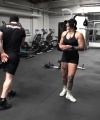 Rhea_Ripley_flexes_on_Sheamus_with_her__Nightmare__Arms_workout_5678.jpg