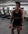 Rhea_Ripley_flexes_on_Sheamus_with_her__Nightmare__Arms_workout_5710.jpg