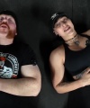 Rhea_Ripley_flexes_on_Sheamus_with_her__Nightmare__Arms_workout_5772.jpg