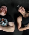 Rhea_Ripley_flexes_on_Sheamus_with_her__Nightmare__Arms_workout_5774.jpg