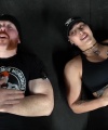 Rhea_Ripley_flexes_on_Sheamus_with_her__Nightmare__Arms_workout_5778.jpg