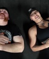 Rhea_Ripley_flexes_on_Sheamus_with_her__Nightmare__Arms_workout_5779.jpg