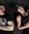 Rhea_Ripley_flexes_on_Sheamus_with_her__Nightmare__Arms_workout_5781.jpg