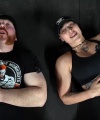 Rhea_Ripley_flexes_on_Sheamus_with_her__Nightmare__Arms_workout_5782.jpg