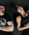 Rhea_Ripley_flexes_on_Sheamus_with_her__Nightmare__Arms_workout_5784.jpg