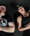 Rhea_Ripley_flexes_on_Sheamus_with_her__Nightmare__Arms_workout_5786.jpg