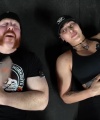 Rhea_Ripley_flexes_on_Sheamus_with_her__Nightmare__Arms_workout_5787.jpg