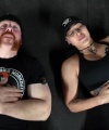 Rhea_Ripley_flexes_on_Sheamus_with_her__Nightmare__Arms_workout_5788.jpg