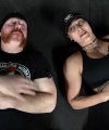 Rhea_Ripley_flexes_on_Sheamus_with_her__Nightmare__Arms_workout_5793.jpg