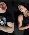 Rhea_Ripley_flexes_on_Sheamus_with_her__Nightmare__Arms_workout_5925.jpg