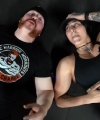 Rhea_Ripley_flexes_on_Sheamus_with_her__Nightmare__Arms_workout_5962.jpg