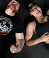 Rhea_Ripley_flexes_on_Sheamus_with_her__Nightmare__Arms_workout_5989.jpg