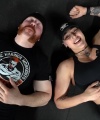 Rhea_Ripley_flexes_on_Sheamus_with_her__Nightmare__Arms_workout_5997.jpg