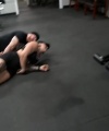 Rhea_Ripley_flexes_on_Sheamus_with_her__Nightmare__Arms_workout_6052.jpg