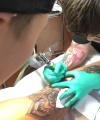 Rhea_Ripley_gets_a_tattoo21_603.jpg