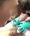 Rhea_Ripley_gets_a_tattoo21_604.jpg