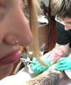 Rhea_Ripley_gets_a_tattoo21_607.jpg