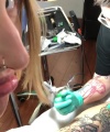 Rhea_Ripley_gets_a_tattoo21_610.jpg