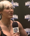 Rhea_Ripley_on_Women_s_Tag_Titles2C_Charlotte_Flair2C_WrestleMania_0851.jpg