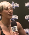 Rhea_Ripley_on_Women_s_Tag_Titles2C_Charlotte_Flair2C_WrestleMania_0852.jpg