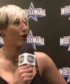 Rhea_Ripley_on_Women_s_Tag_Titles2C_Charlotte_Flair2C_WrestleMania_1571.jpg