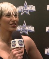 Rhea_Ripley_on_Women_s_Tag_Titles2C_Charlotte_Flair2C_WrestleMania_1574.jpg