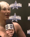 Rhea_Ripley_on_Women_s_Tag_Titles2C_Charlotte_Flair2C_WrestleMania_1575.jpg