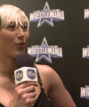 Rhea_Ripley_on_Women_s_Tag_Titles2C_Charlotte_Flair2C_WrestleMania_1576.jpg