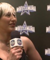 Rhea_Ripley_on_Women_s_Tag_Titles2C_Charlotte_Flair2C_WrestleMania_1577.jpg