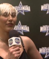 Rhea_Ripley_on_Women_s_Tag_Titles2C_Charlotte_Flair2C_WrestleMania_1580.jpg