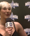 Rhea_Ripley_on_Women_s_Tag_Titles2C_Charlotte_Flair2C_WrestleMania_1581.jpg