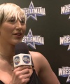 Rhea_Ripley_on_Women_s_Tag_Titles2C_Charlotte_Flair2C_WrestleMania_1583.jpg