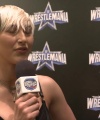 Rhea_Ripley_on_Women_s_Tag_Titles2C_Charlotte_Flair2C_WrestleMania_1585.jpg