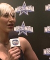 Rhea_Ripley_on_Women_s_Tag_Titles2C_Charlotte_Flair2C_WrestleMania_1586.jpg