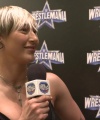 Rhea_Ripley_on_Women_s_Tag_Titles2C_Charlotte_Flair2C_WrestleMania_1593.jpg