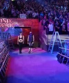 WWE_Money_In_The_Bank_2023_Rhea_Ringside_Attacks_Cody_0574.jpg