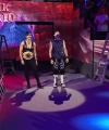WWE_Money_In_The_Bank_2023_Rhea_Ringside_Attacks_Cody_0584.jpg
