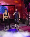 WWE_Money_In_The_Bank_2023_Rhea_Ringside_Attacks_Cody_0589.jpg