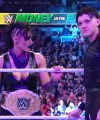 WWE_Money_In_The_Bank_2023_Rhea_Ringside_Attacks_Cody_0900.jpg