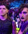 WWE_Money_In_The_Bank_2023_Rhea_Ringside_Attacks_Cody_0970.jpg