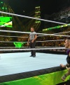 WWE_Money_In_The_Bank_2023_Rhea_Ringside_Attacks_Cody_1468.jpg