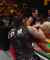 WWE_Money_In_The_Bank_2023_Rhea_Ringside_Attacks_Cody_1499.jpg