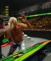 WWE_Money_In_The_Bank_2023_Rhea_Ringside_Attacks_Cody_1501.jpg