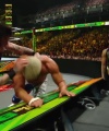 WWE_Money_In_The_Bank_2023_Rhea_Ringside_Attacks_Cody_1502.jpg