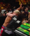 WWE_Money_In_The_Bank_2023_Rhea_Ringside_Attacks_Cody_1505.jpg