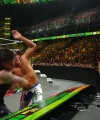 WWE_Money_In_The_Bank_2023_Rhea_Ringside_Attacks_Cody_1508.jpg