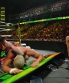 WWE_Money_In_The_Bank_2023_Rhea_Ringside_Attacks_Cody_1509.jpg