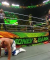 WWE_Money_In_The_Bank_2023_Rhea_Ringside_Attacks_Cody_1559.jpg